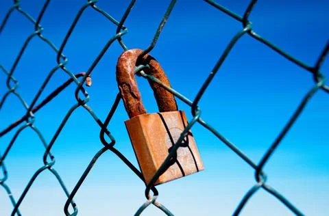 Padlock rusty by the passage of time Stock Photos