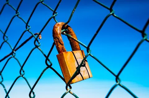 Padlock rusty by the passage of time Stock Photos