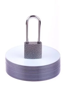 Padlock on the stack of cd Stock Photos