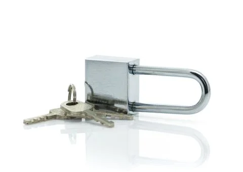 Padlock with three keys on white background Stock Photos