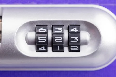 Padlock with Three Numbers on a Suitcase Closeup of a security padlock wit... Stock-Fotos