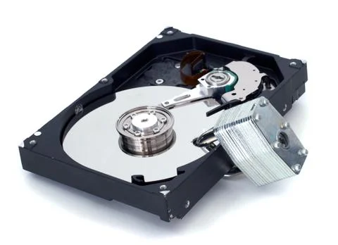 Padlock through hard drive with shadow Stock Photos
