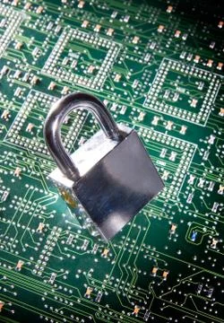 Padlock on top of integrated circuit Foto stock