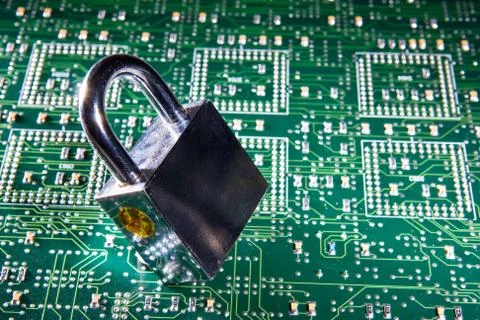 Padlock on top of integrated circuit Foto stock