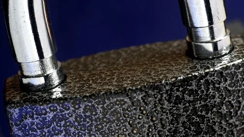 Padlock unlocking. Close-up shot. Stock Footage 74730528