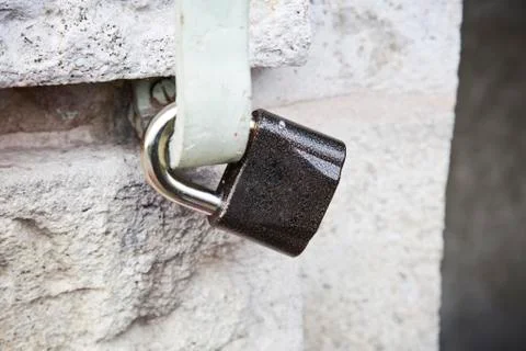 Padlock on wall Stock Photos