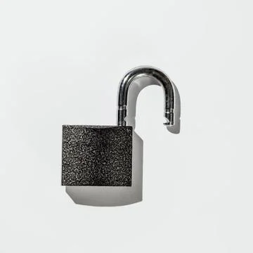 Padlock on white background isolate Stock Photos