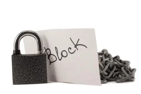 Padlock on a white background. The lock is locked. The chain is metal. Stock Photos