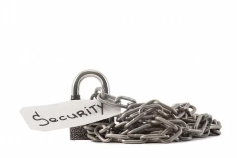 Padlock on a white background. The lock is locked. The chain is metal. Stock Photos