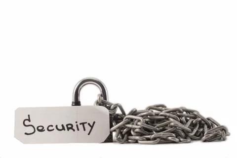 Padlock on a white background. The lock is locked. The chain is metal. Stock Photos