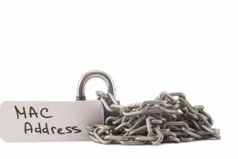 Padlock on a white background. The lock is locked. The chain is metal. Stock Photos