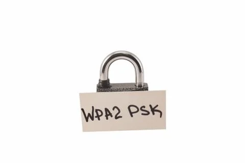 Padlock on a white background. The lock is locked. The chain is metal. Stock Photos
