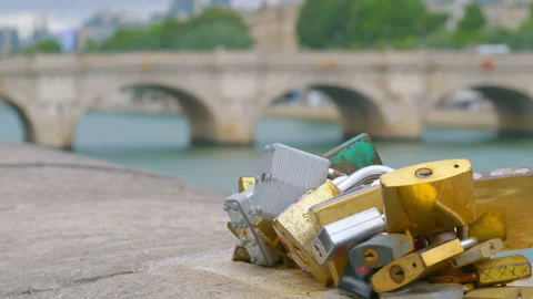 Padlocks on the bridge of lovers in Paris in 4k 動画素材 165589667