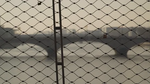 Padlocks hooked to a wire grid, Paris, France Vidéo 104145779