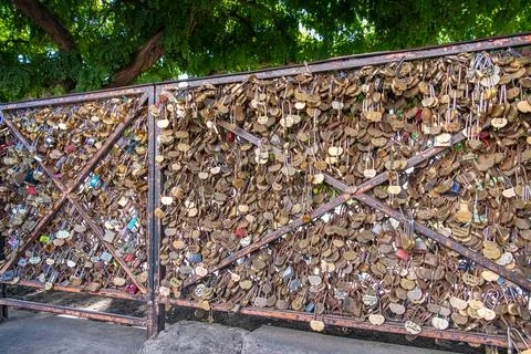 Padlocks - Love locks on a chain link fence  in Paris, France Stock Photos
