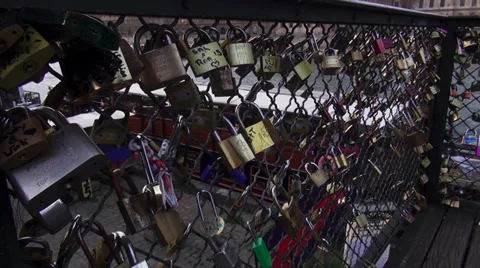 Padlocks from lovers attached to bridge Pont des Arts in Paris Stock Footage 38385457