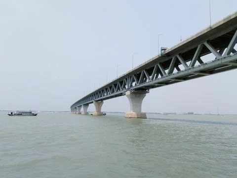The Padma Bridge is a multipurpose road-rail bridge across the Padma River Фото