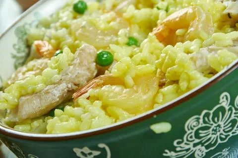 Paella with cod and shrimp Foto stock