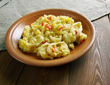 Paella with squid Stock Photos