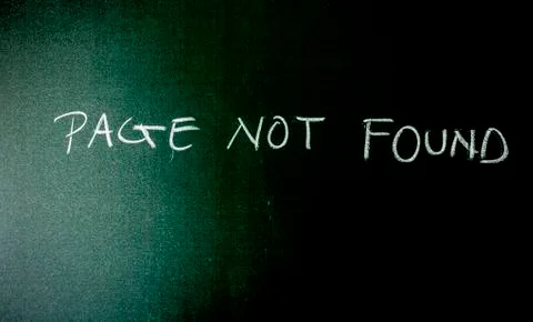 Page Not Found Error 404 written on a blackboard with chalk. Stock Photos