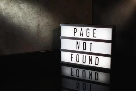 Page not found message on a light box with a dark cinematic feel Stock Photos
