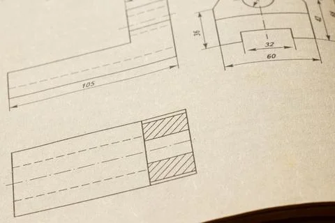 A page with a technical drawing and part dimensions for engineering topics, d Stock Photos