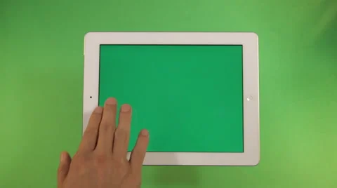 Page turning hand touch screen green background Stock Footage 41066461