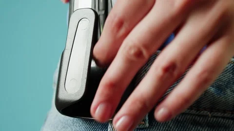 Pager beeper device close up on a desk, retro phone 90s instant communication Stock Footage 295143205