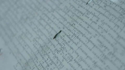 Pages of an old book with Slavonic writings. Vintage texture. Books of Orthodox Stock Footage 252681467