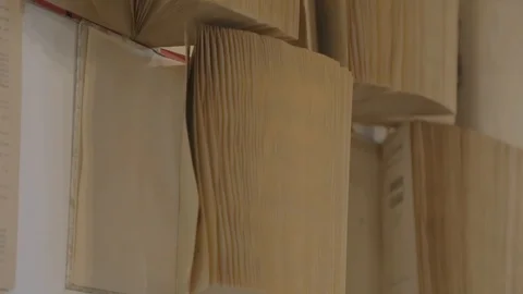 Pages of old books on wind Stock Footage 90360930