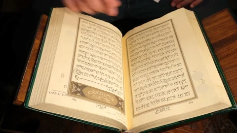 Pages of the quran Stock Footage 174409634