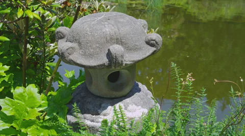 Pagoda Statue by Pond Stock Footage 35289472