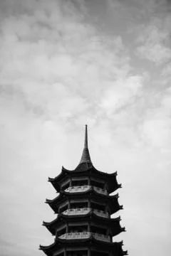 Pagoda tower with dramatic cloud black and white Stock Photos