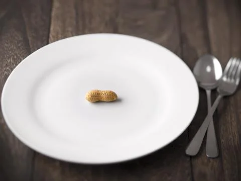 Paid peanuts Stock Photos