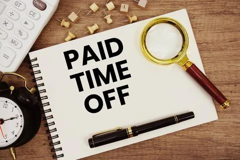 Paid Time Off text written on notepad with pen, alarm clock, magnifying gla.. Stock Photos