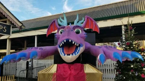 Paignton, Devon: An animatronic dragon outside the Steam Railway station Stock Footage 226553023