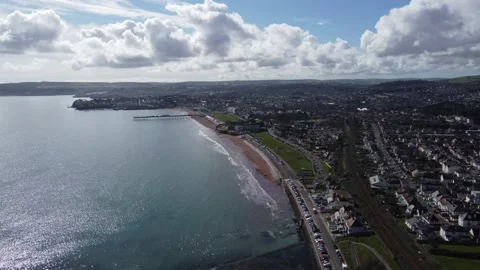 Paignton, Devon, England: Drone View: Preston Sands &amp; the town of Paignton Stock Footage 198501099