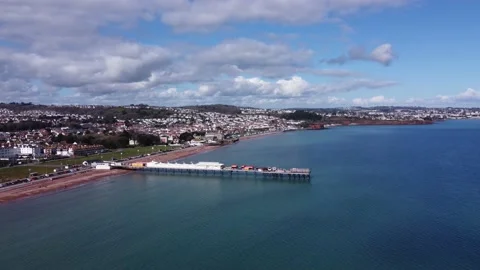 Paignton, Devon, England: Drone View: Paignton pier, promenade &amp; Preston Sands Stock Footage 198501574