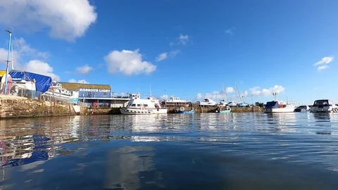 Paignton, Devon, England: Timelapse: Clouds roll over the harbour on a sunny day Stock Footage 125640351