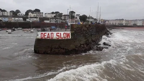 Paignton, Devon: Storm waves hit harbour wall (Mono audio) Stock Footage 126772224