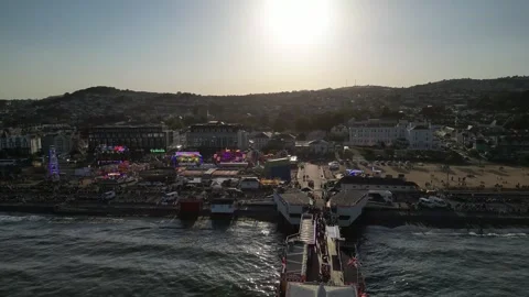 Paignton, England (26/08/12): Partial eclipse and funfair on Paignton Green Video stock 342317400