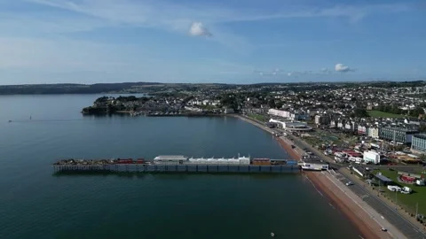 Paignton, S. Devon, England: DRONE VIEWS: Paignton Pier, the Green &amp; Coastline Stock Footage 246538919