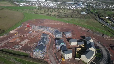 Paignton, S. Devon, England: DRONE VIEWS: A new build housing construction site Stock Footage 273858419