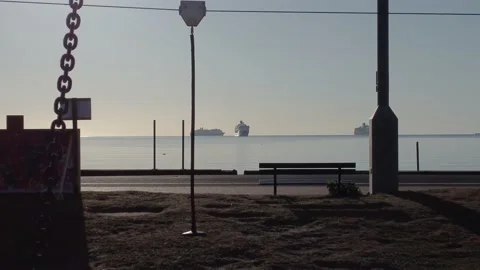 Paignton Seafront at Sunrise - Tracking back through swing Stock Footage 155101378