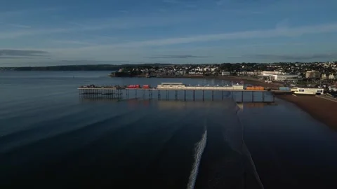 Paignton, South Devon, England: DRONE VIEWS: Paignton Pier and the Coastline Stock Footage 247489686