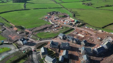 Paignton, South Devon, England: DRONE VIEWS: New housing construction site Stock Footage 273858656