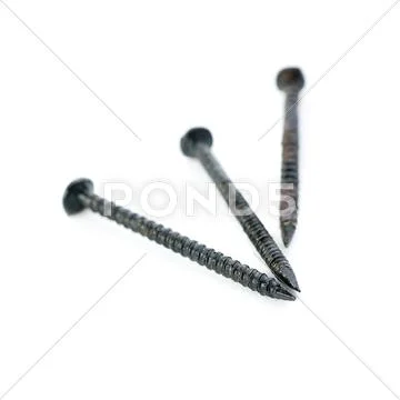 Pail of Metal nails isolated over the white background Stock Photos