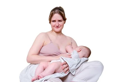 Pain and problems in a woman while breastfeeding a baby, isolated on a whit.. Stock Photos