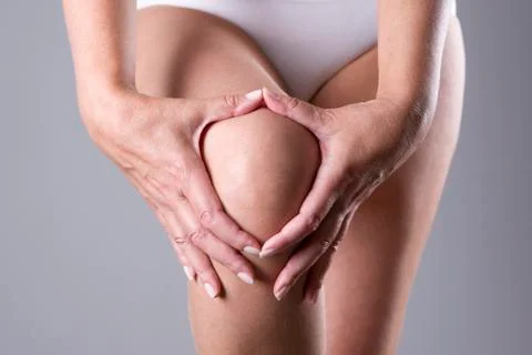 Pain in the knee Stock Photos