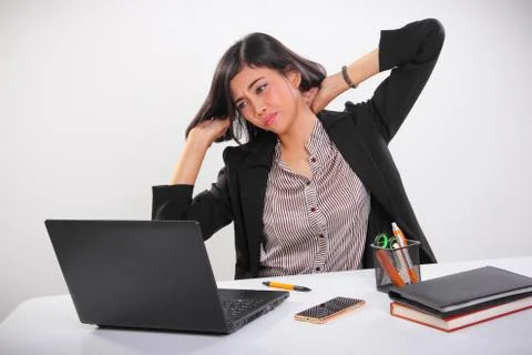 Painful body stiffness feeling from overworking in front of computer Stock Photos